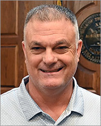 Commisioner, Dane Burns