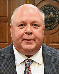 Commissioner, Darryl Thompson