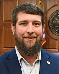 Commissioner, Dylan Clayton